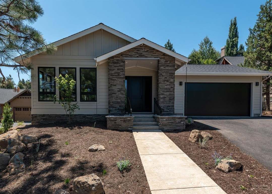 Single-story new home with stone accents